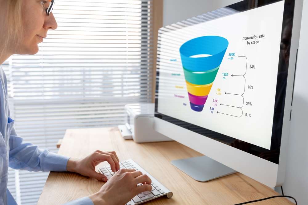 woman looking at conversion rates by stage