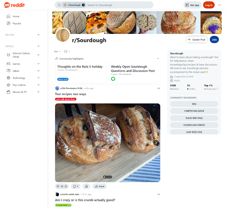 Screenshot of the r/Sourdough subreddit on Reddit, with two sourdough loaves on a cooling rack, a subreddit description to the right, navigation links to the left—showcasing how Reddit for digital marketing connects baking enthusiasts.