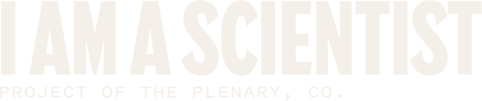 Large bold text says I AM A SCIENTIST with smaller text below reading PROJECT OF THE PLENARY, CO. on a black background.