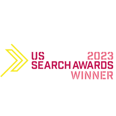 Logo with yellow arrows pointing right and text reading US Search Awards 2023 Winner in bold red and pink letters on a white background, celebrating excellence in AI services.
